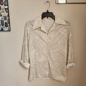 White and green, floral blouse